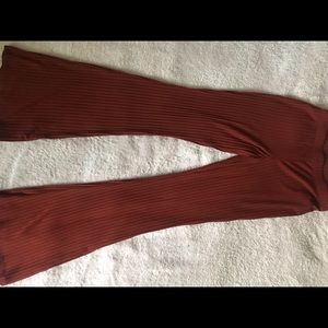Rust color body hugging flare pants